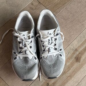 On Cloud White and Gray Athletic Sneakers